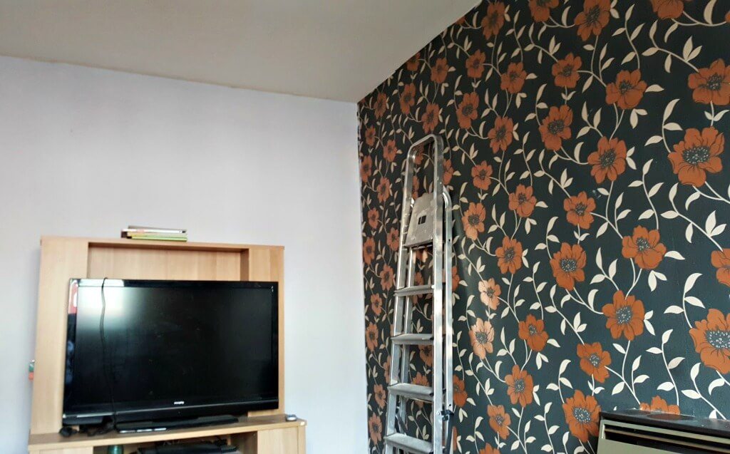 new year new you picture of a partly decorated room with ladders