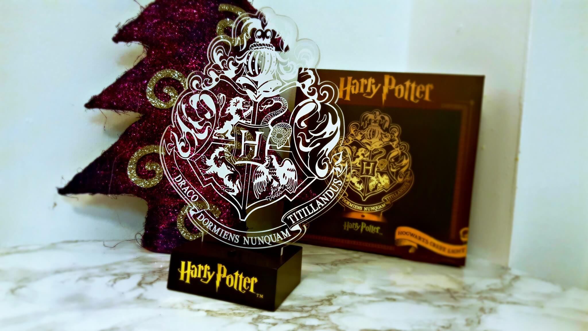hogwarts crest light from paladone light pictured in front of the box