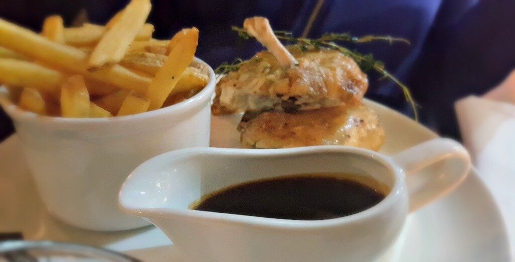 sampling the new menu chicken and chips in a dish with sauce in a jug