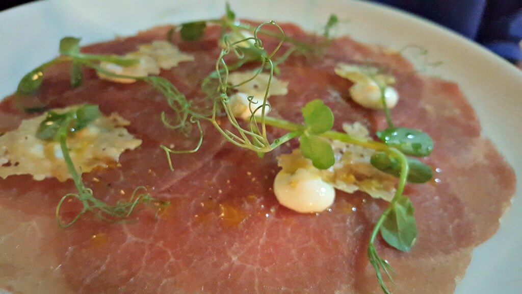 sampling the new menu at browns brasserie & bar beef carpaccio with pea shoots and Parmesan crisps