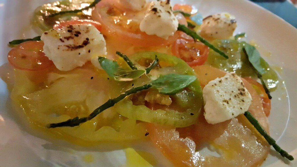sampling the new menu at browns brasserie & bar torched feta with heritage tomatoes and samphire