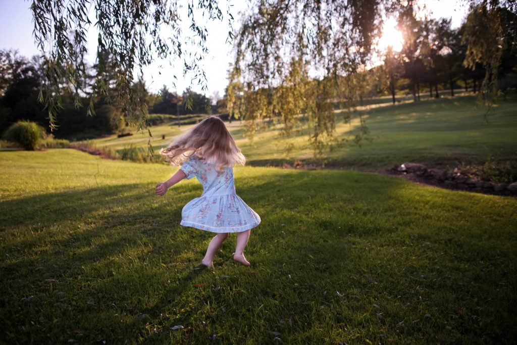 keep-kids-active-girl-dancing-on-grass