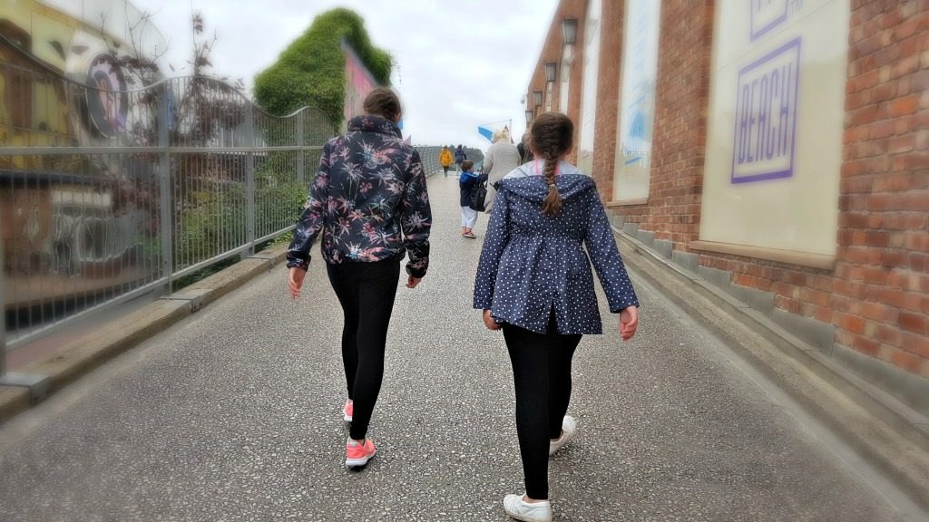 tow-girls -walking-in-pleasure-beach-in-blackpool