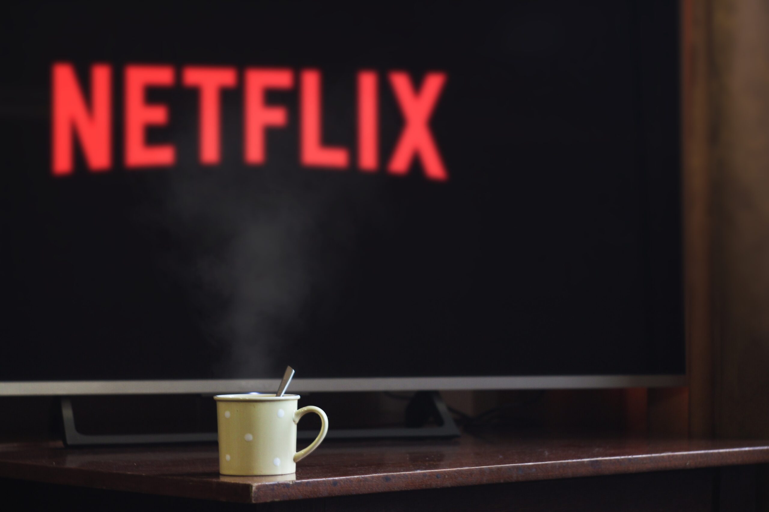 close up of a tv screen showing the word netflix