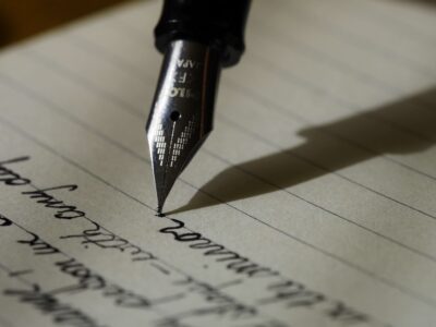 help I have writers block picture of a pen writing