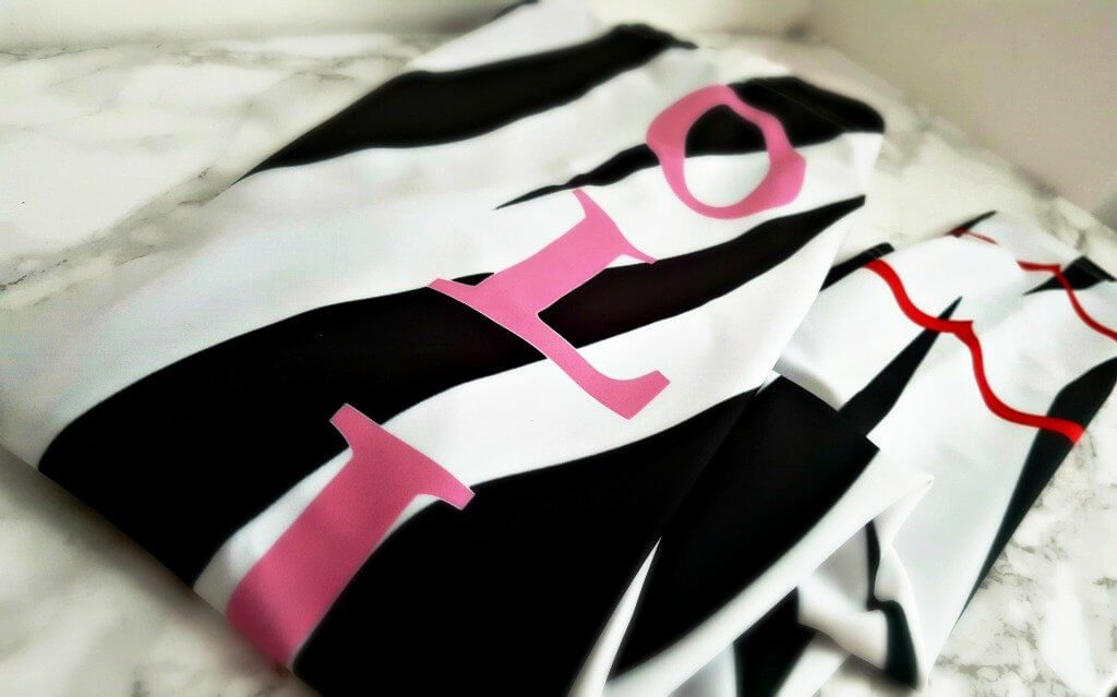 flat lay leggings black and white stripes with the name olivia