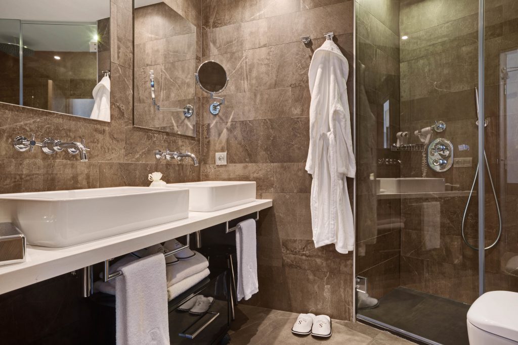 tiled bathroom with walk in shower idea to increase value before selling your home