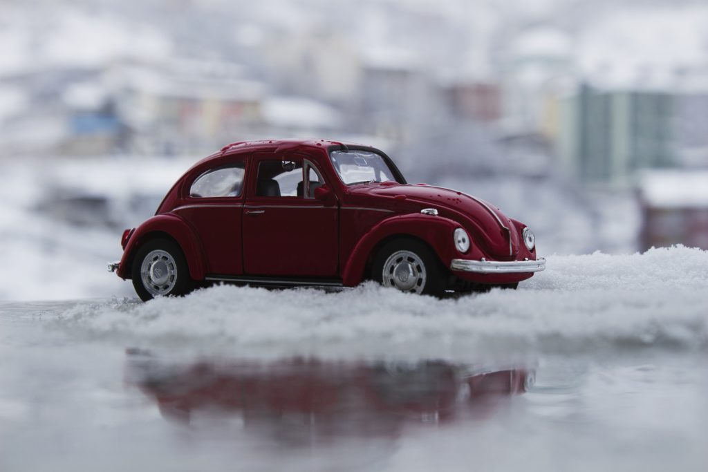 toy car in snow depicting bad weather driving