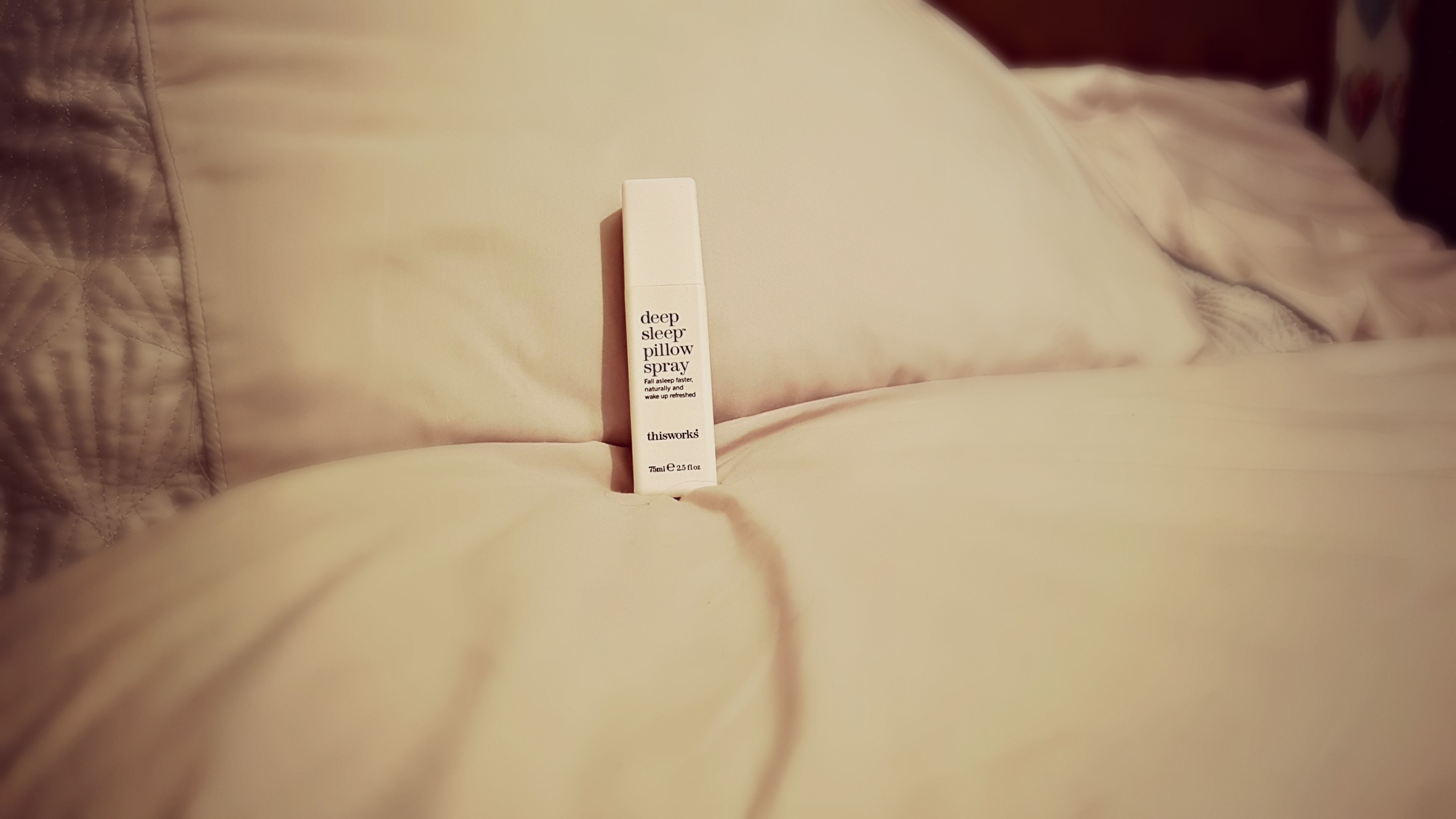 this works sleep spray leaving against a pillow on a bed