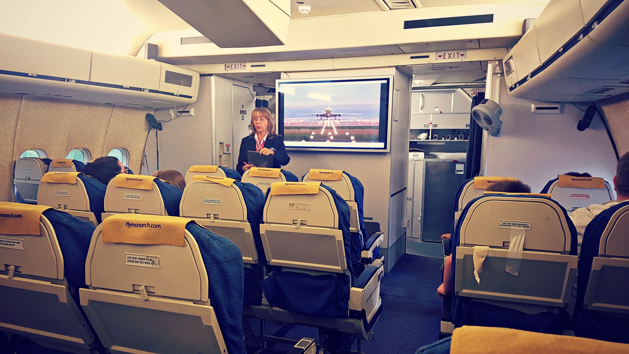 flight academy host onboard a retired airplane at the runway visitor park at manchester airport