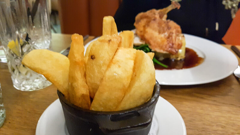 selective focus image of triple cooked chips at marco pierre whites liverpool wheelers restaurant