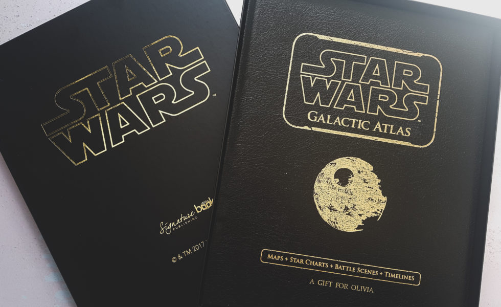 a boxed embossed star wars galactic empire map book personalised with the name olivia
