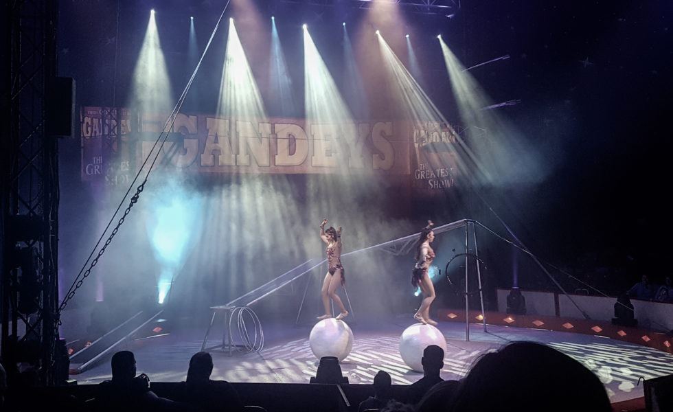 two women performing on giant inflatable balls at gandeys circus
