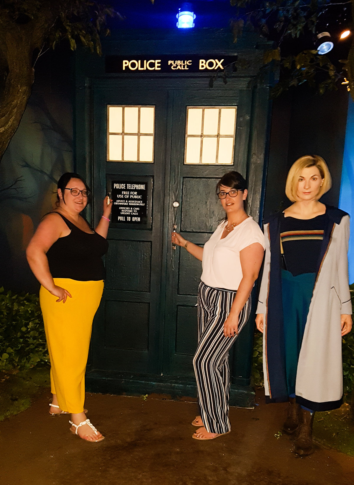 two women opening the tardis at madame tussauds blackpool