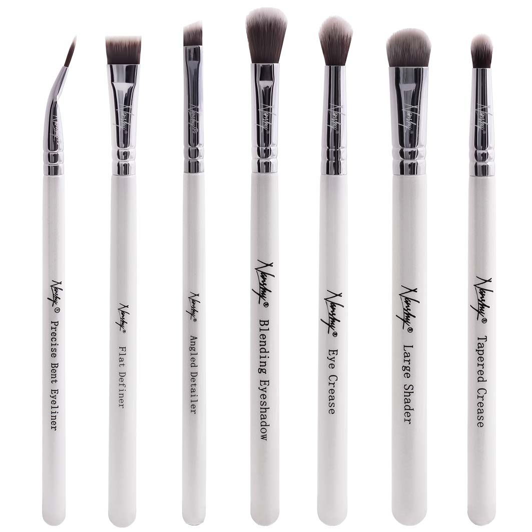 a 7 piece eye makeup brush set in white with writing on the brushes