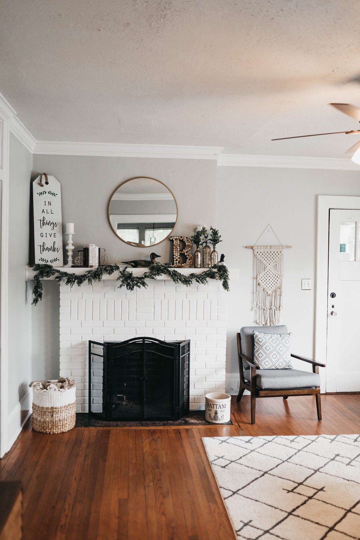 a room with wooden flooring and fireplace