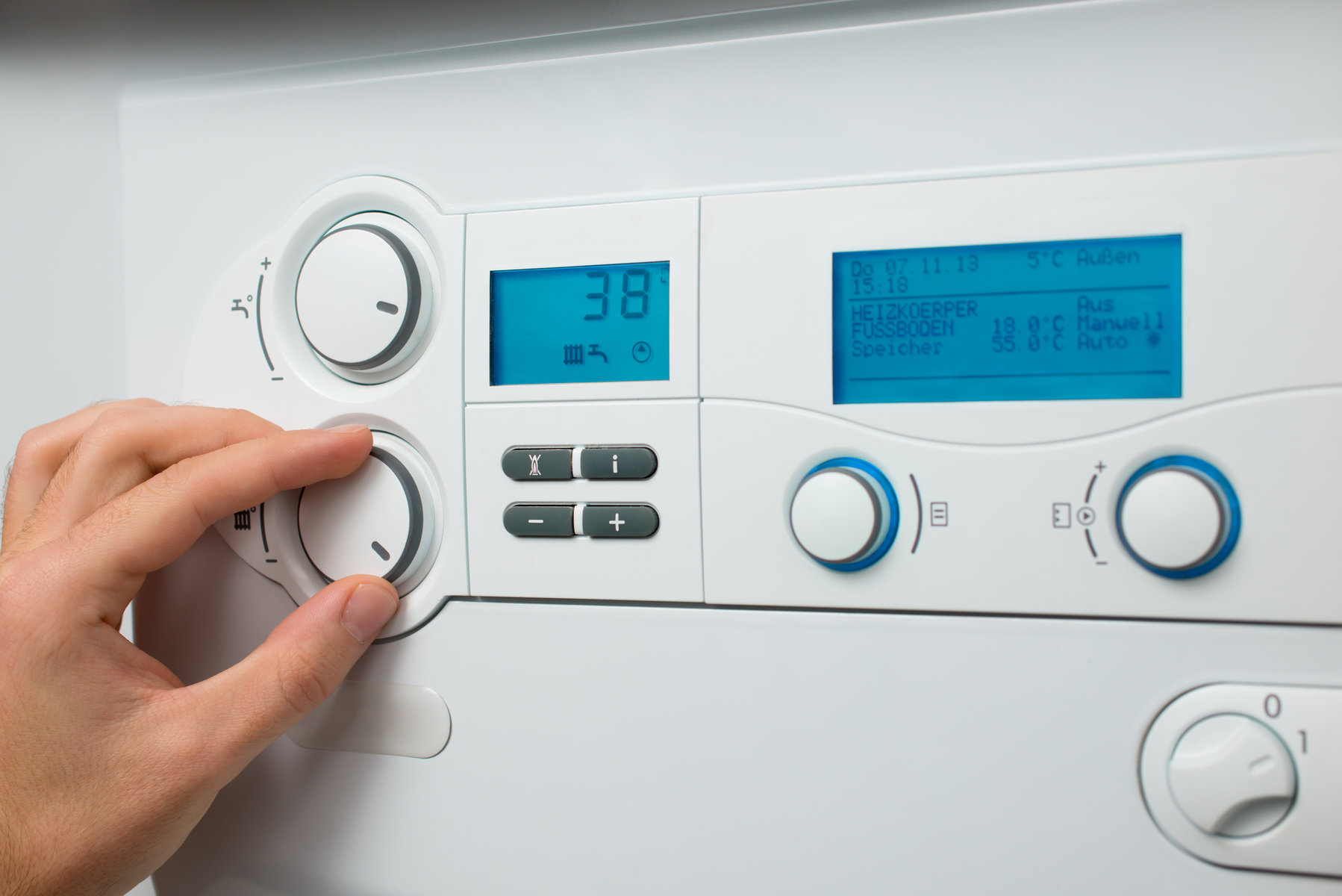 buttons and display on a white home boiler