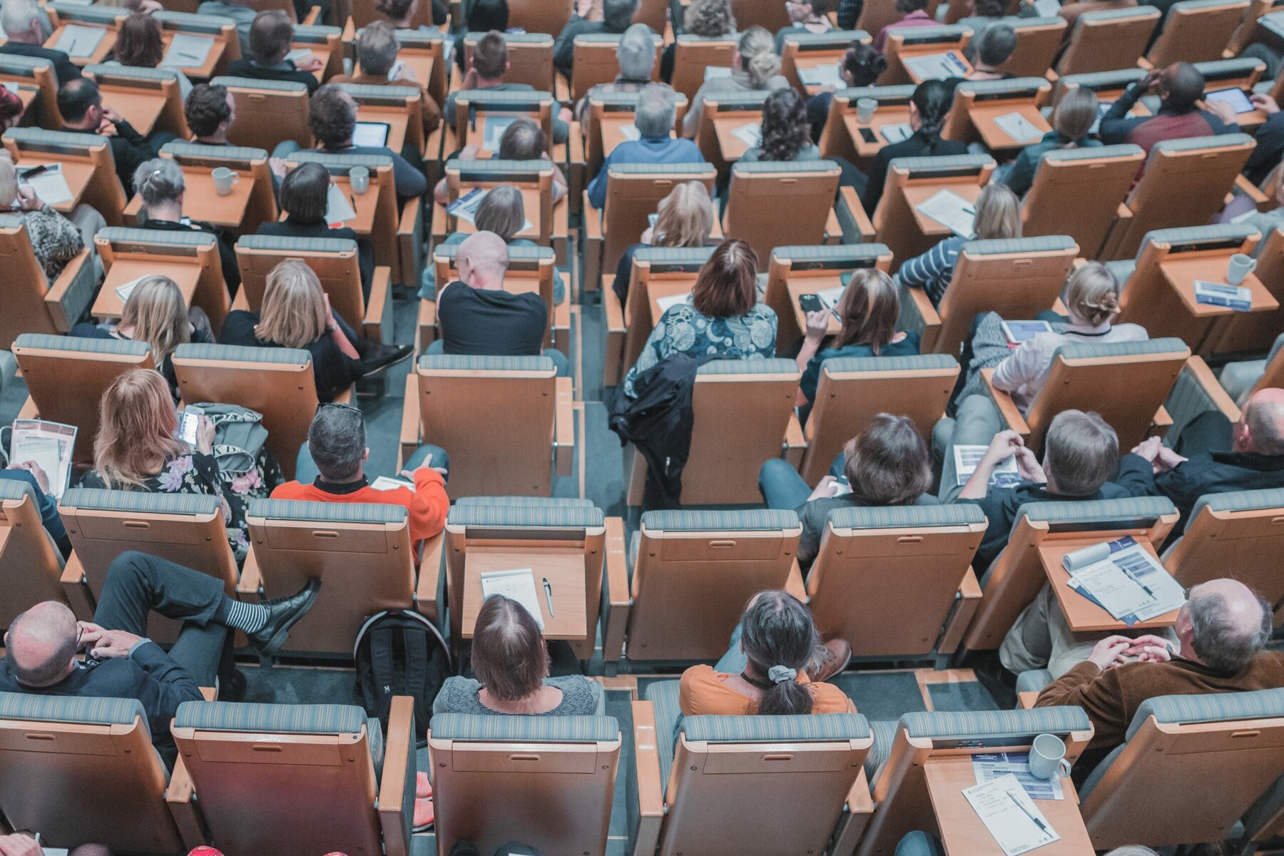 back view of a lecture hall full of students