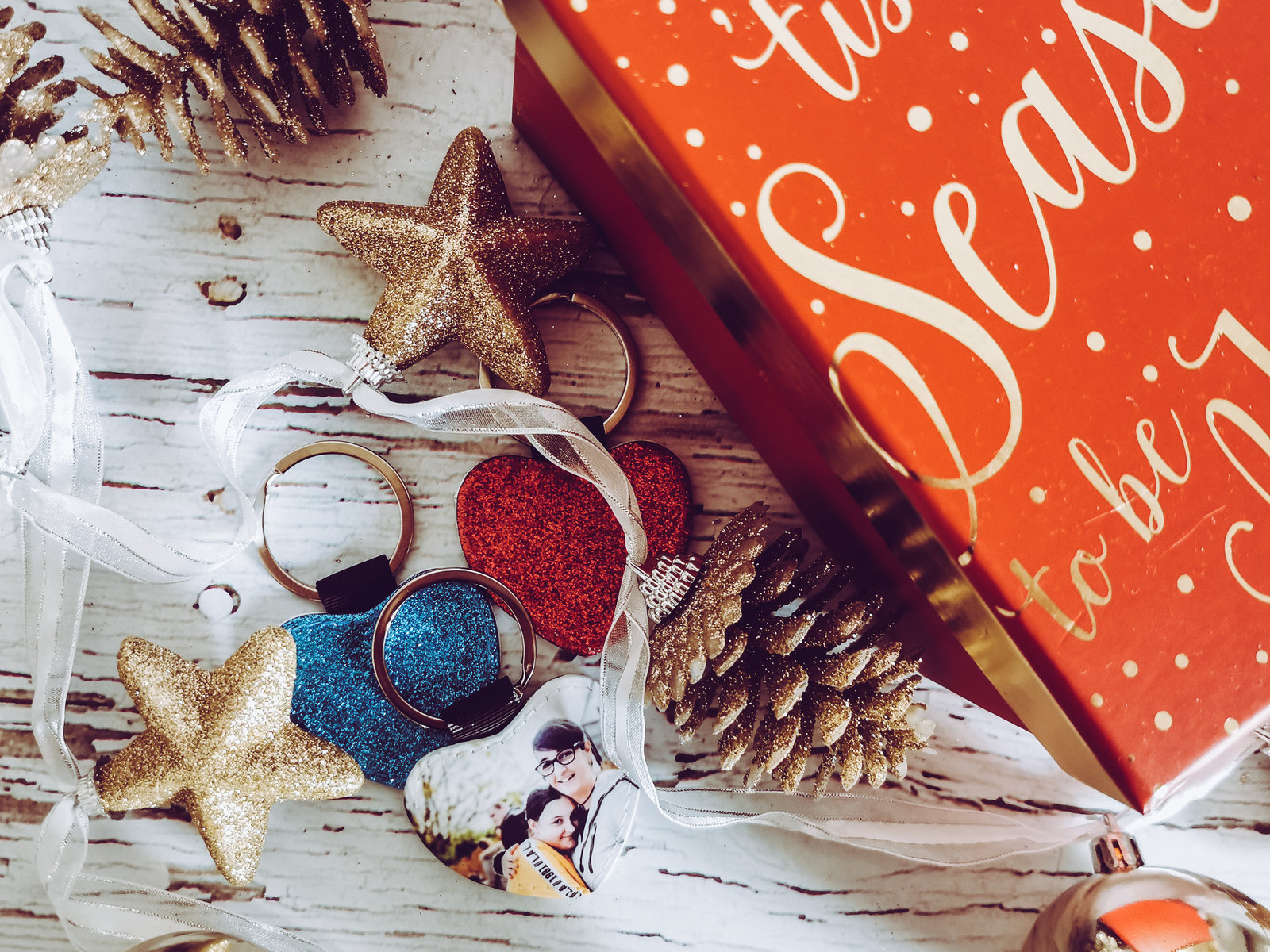 a selection of photo keyrings in a C flatlay