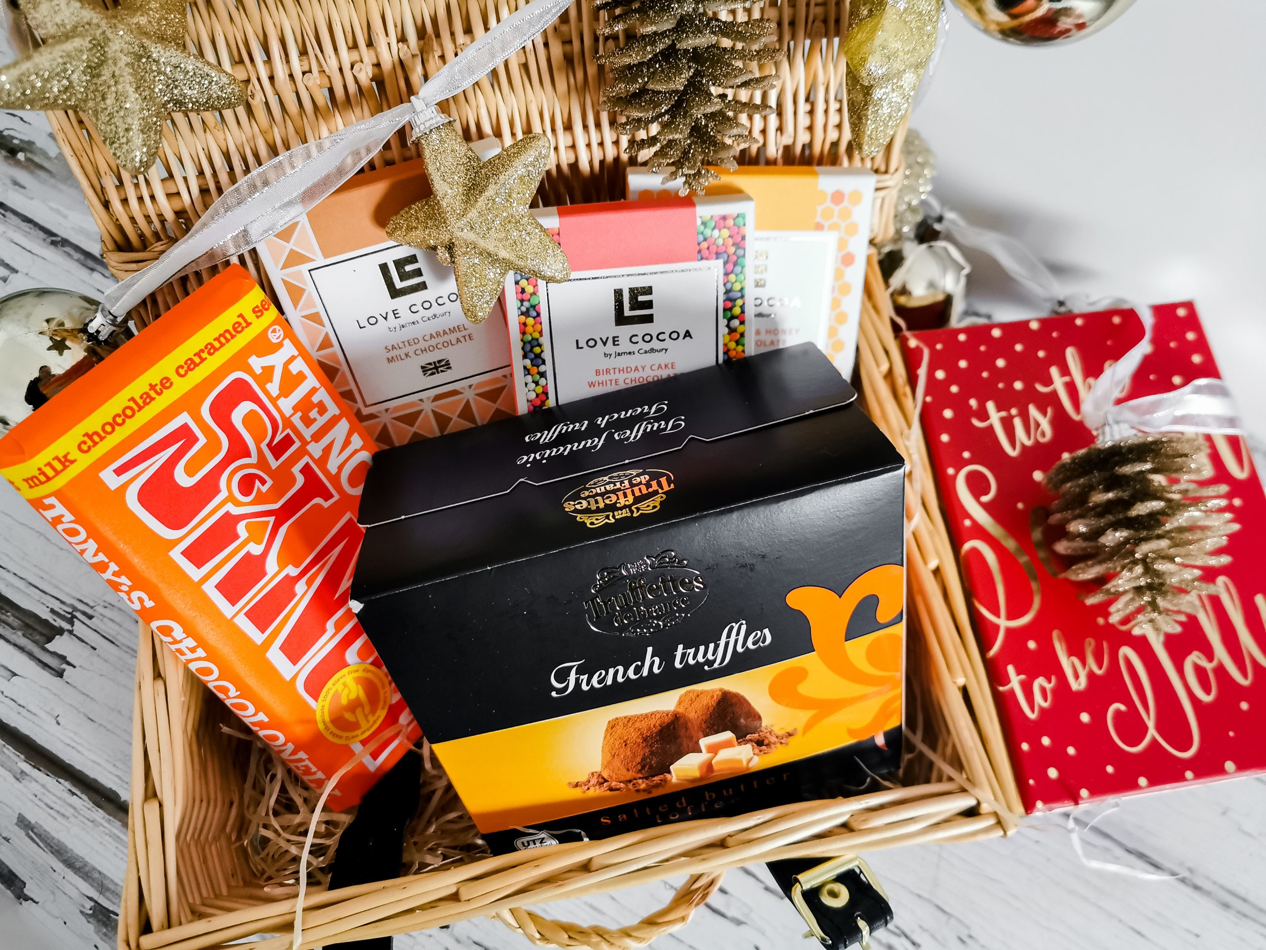 a selection of chocolate bars from sous chef on a small wicker basket