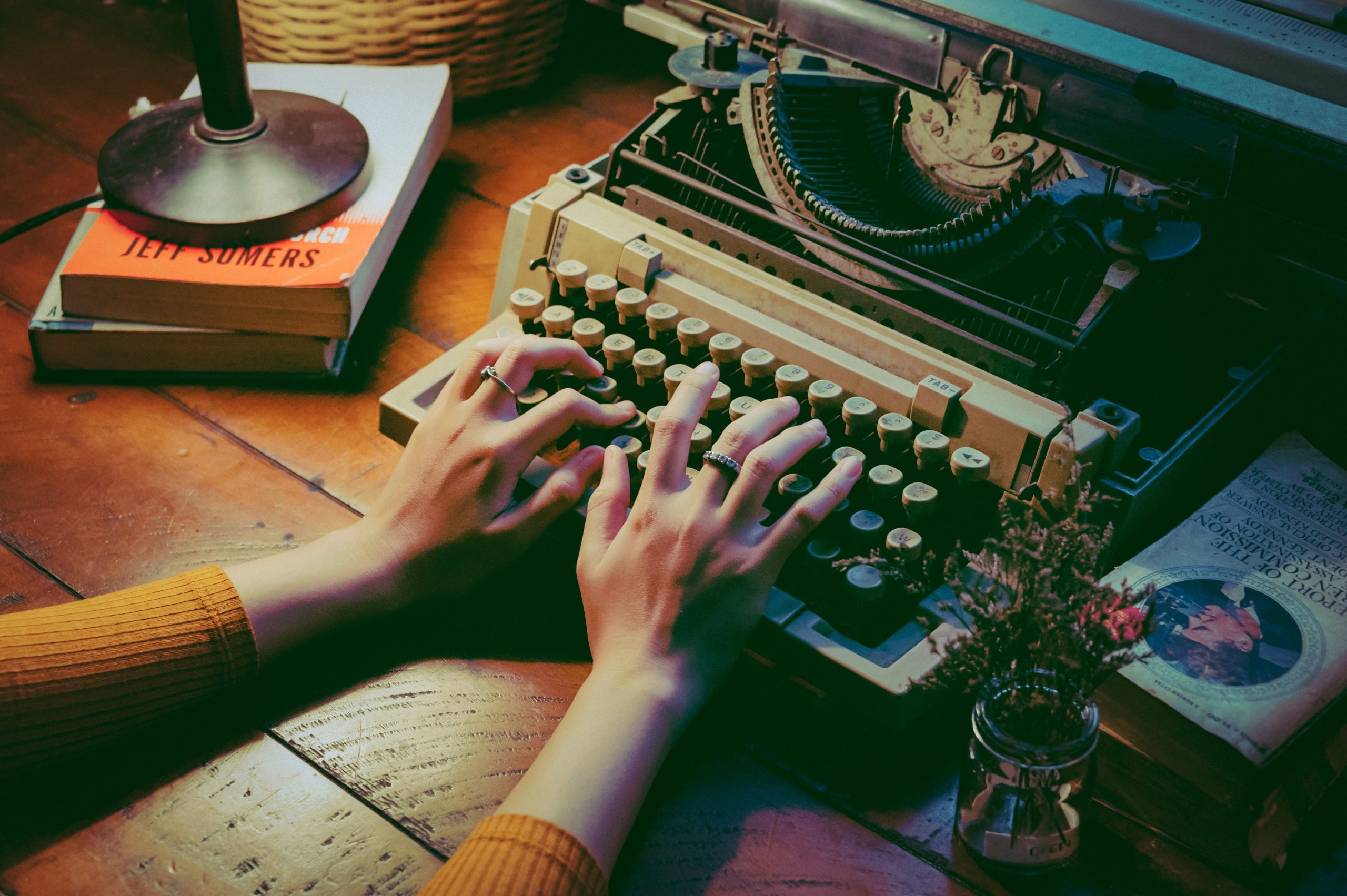 person using a typewriter
