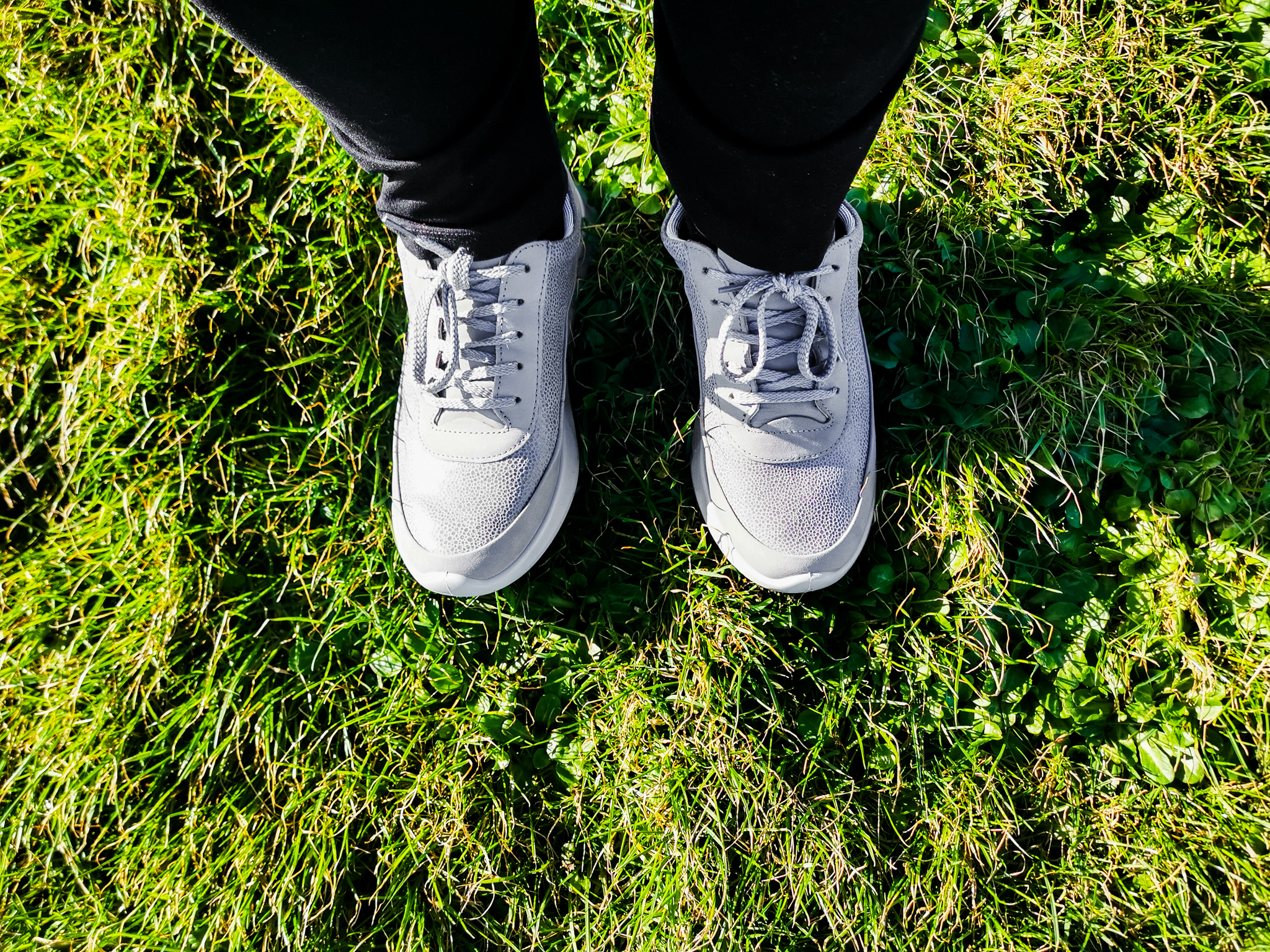 grey hotter shoes on grass