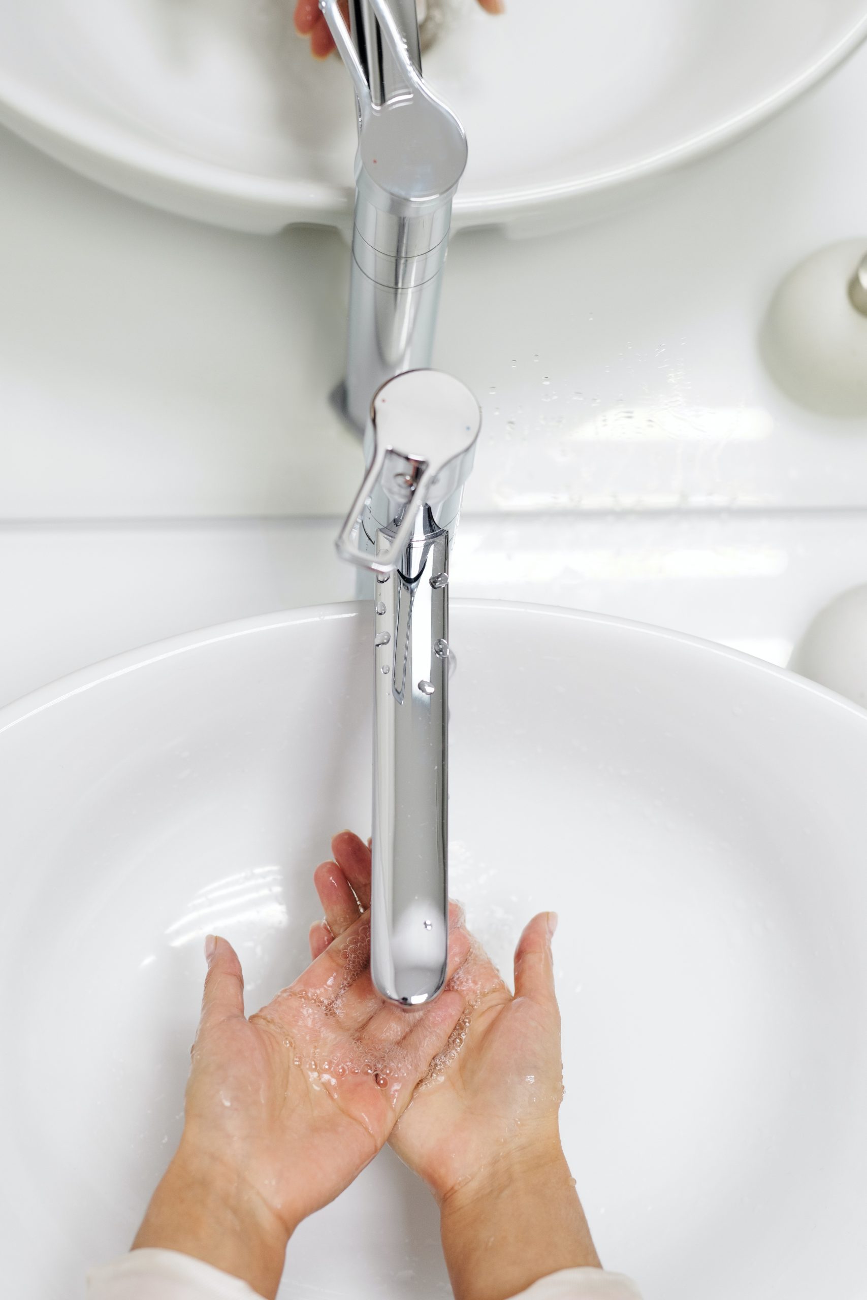 overhead shot of woman washing her hands
