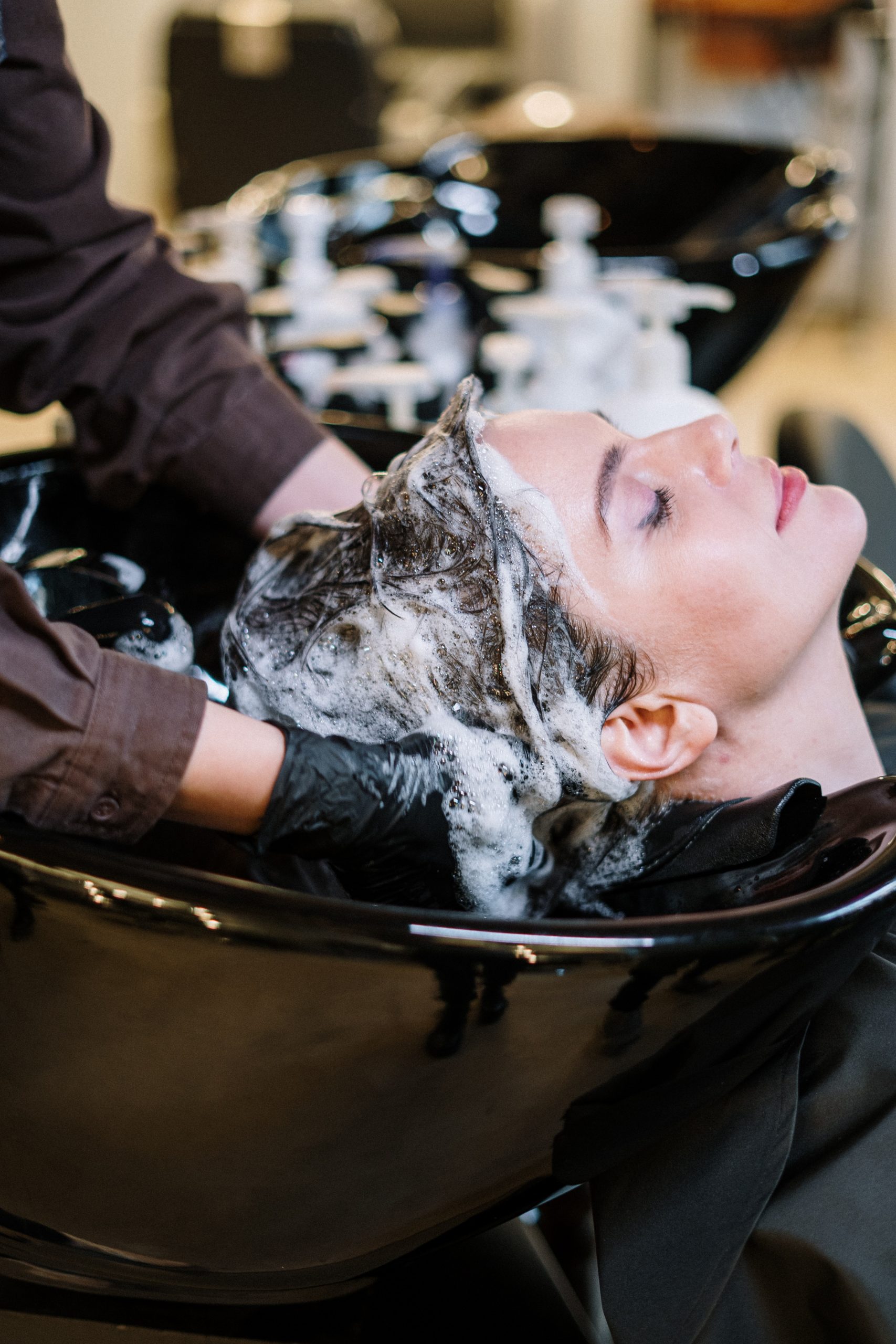 woman having her hair washed