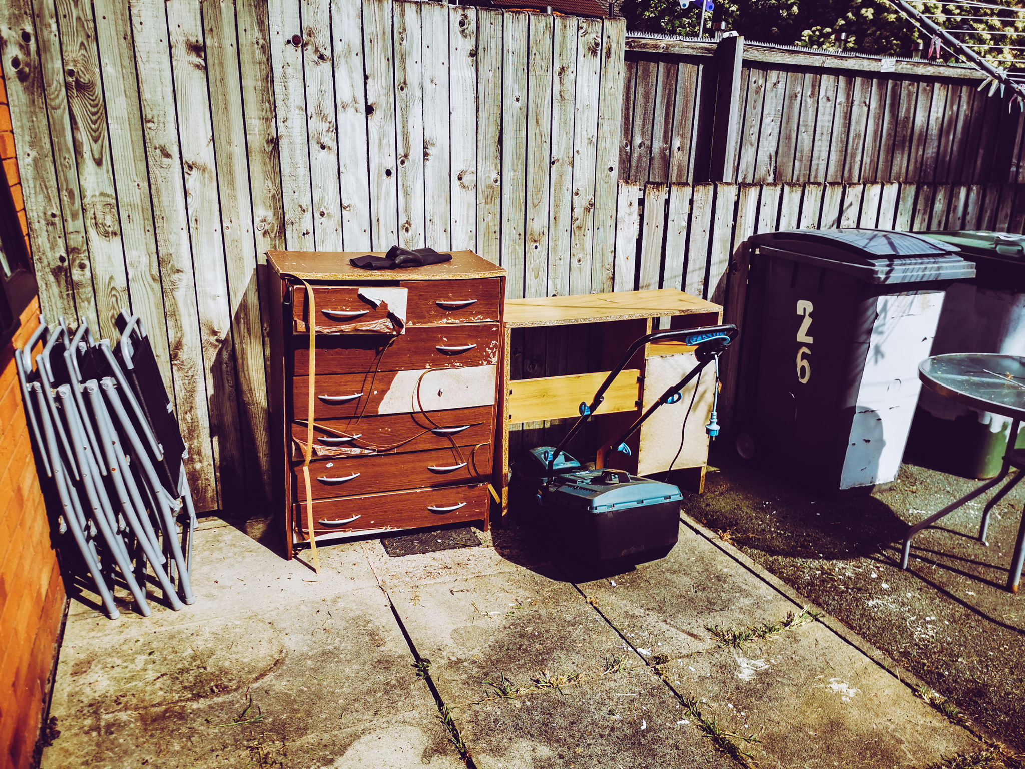 old furniture in a back garden