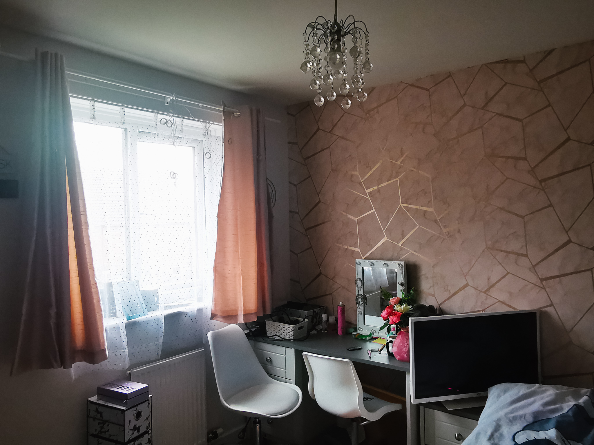 girls bedroom with pink and rose gold colour scheme