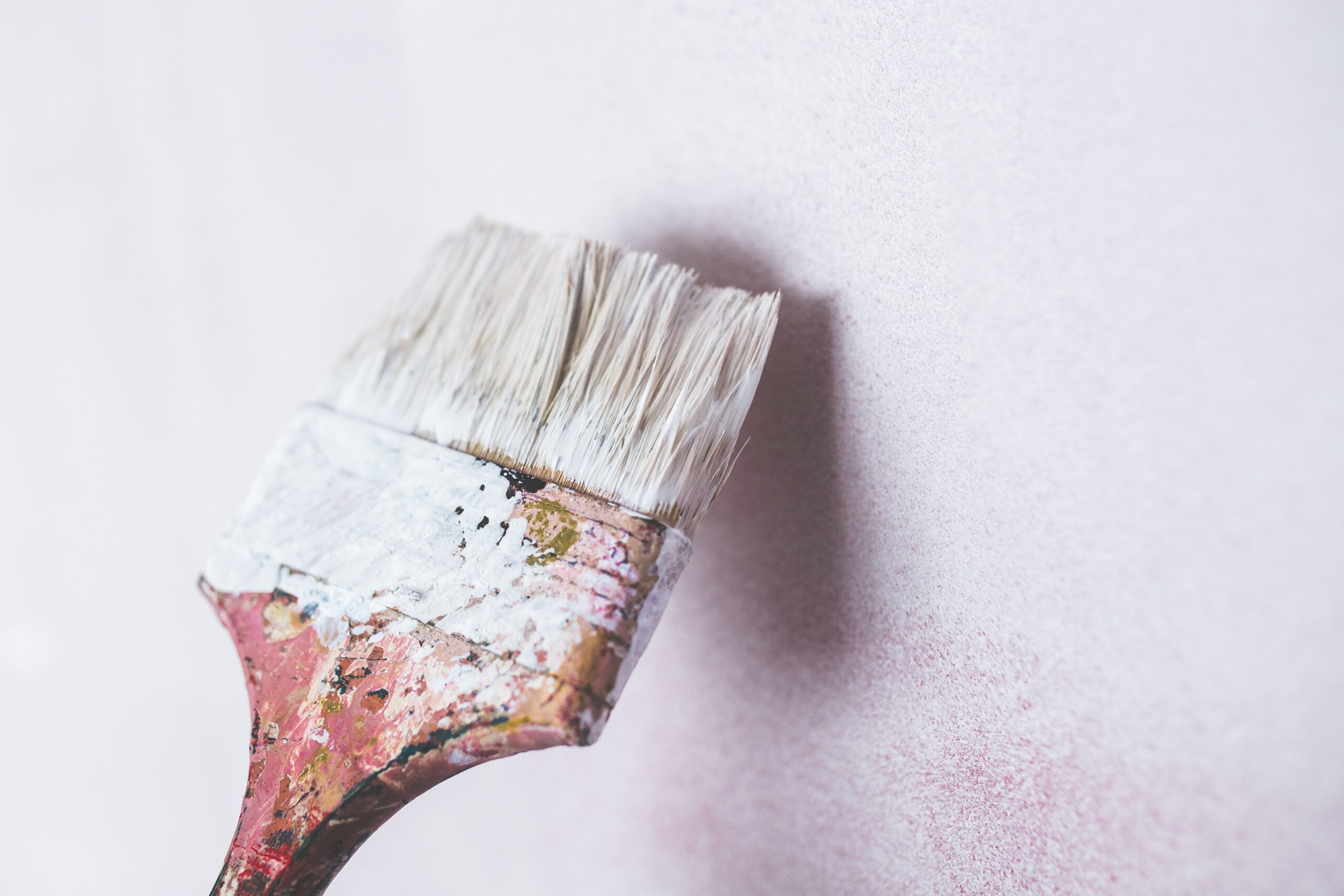 paintbrush on a white wall