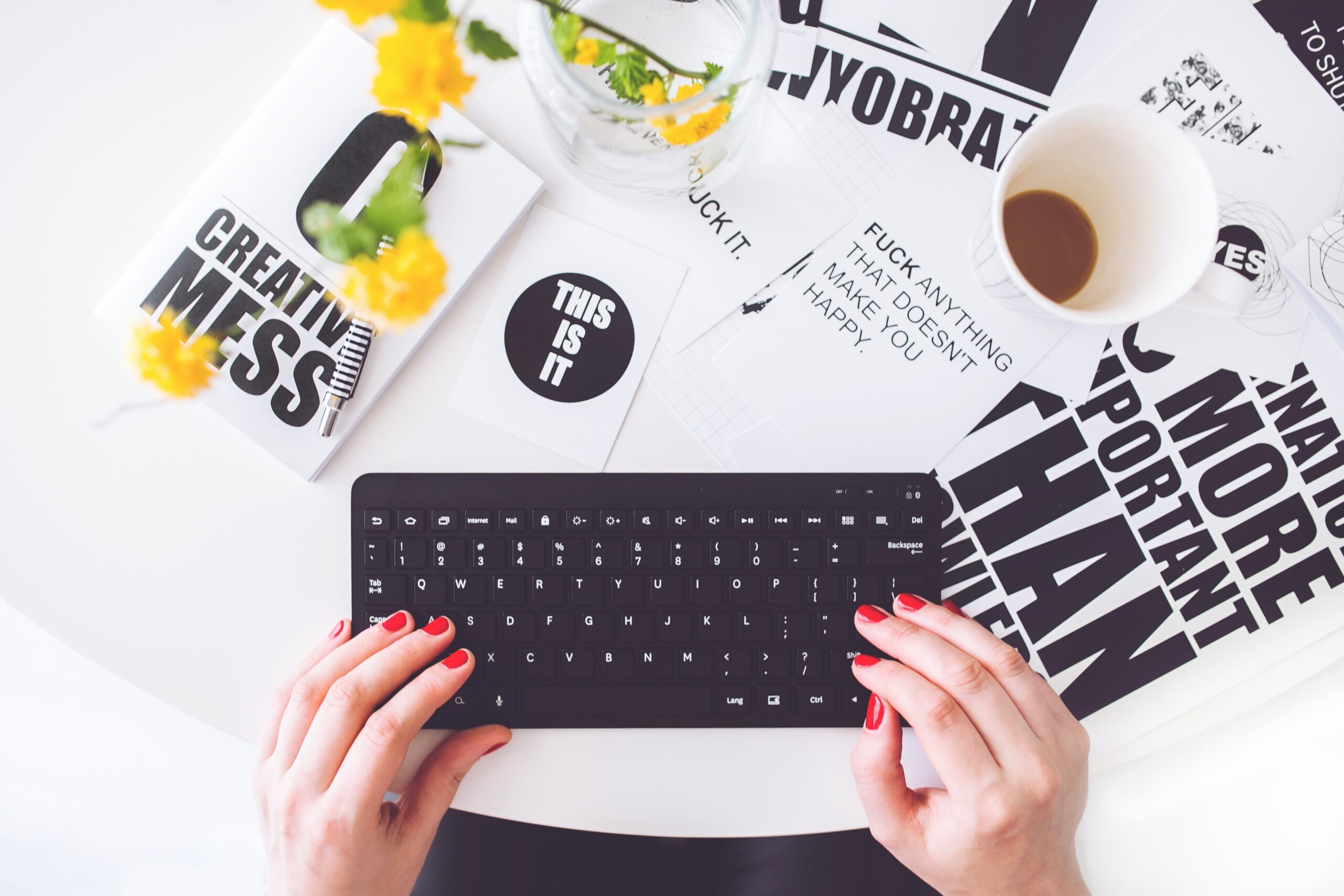 keyboard with documents around it