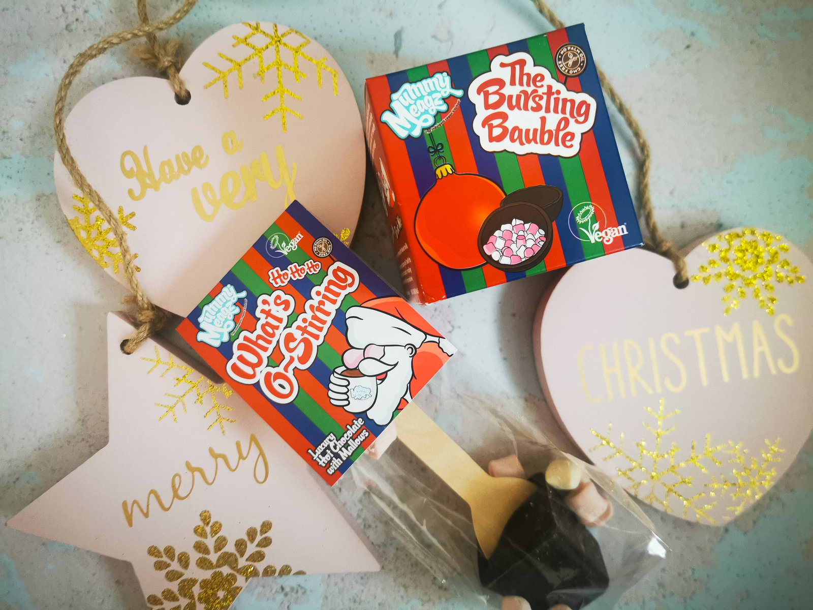 close up of vegan chocoalte bombs in a christmas flatlay