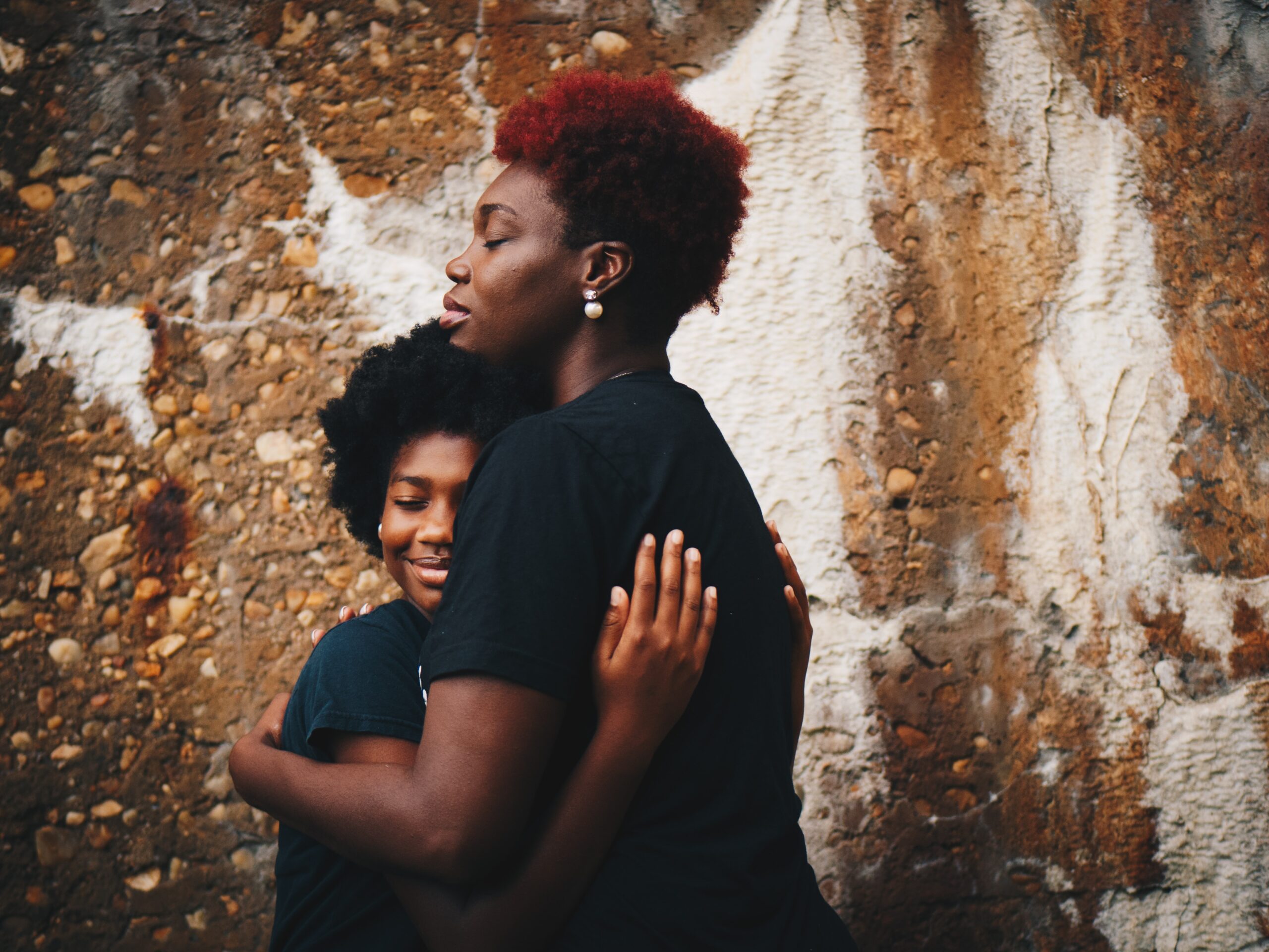 mum hugging a child