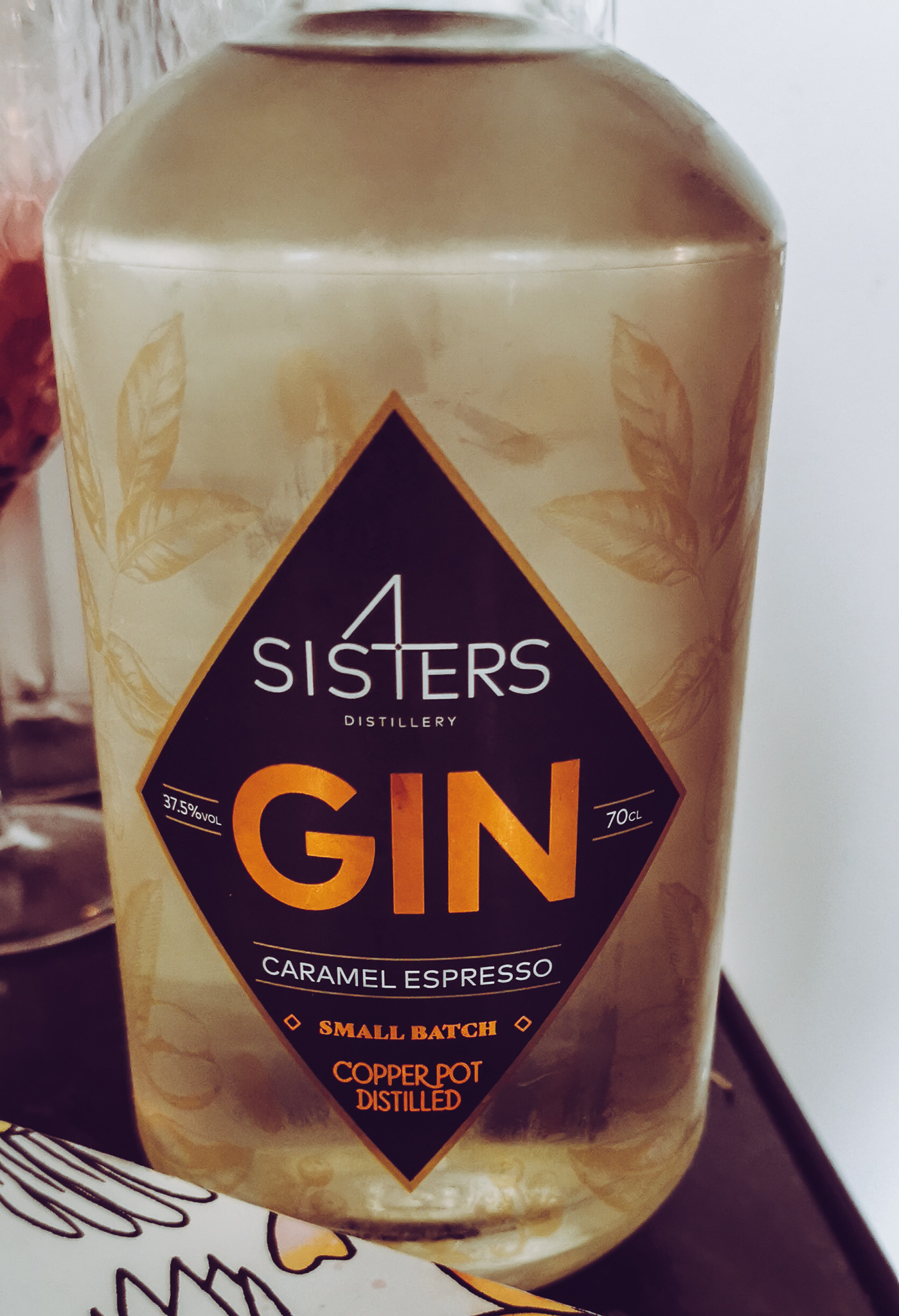 a bottle of 4 sisters caramel espresso gin