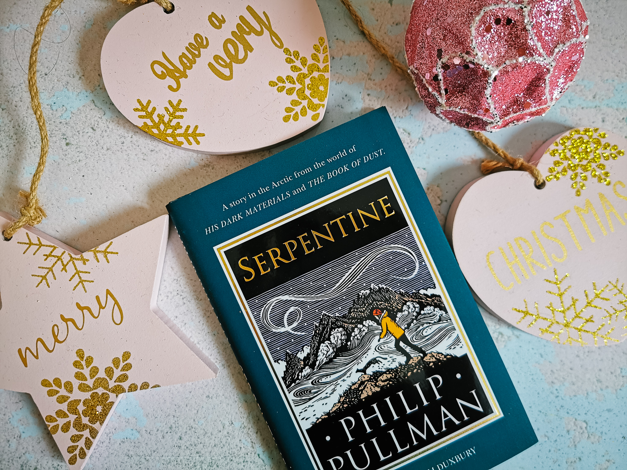 flatlay of the book Serpentine from Phillip Pullman