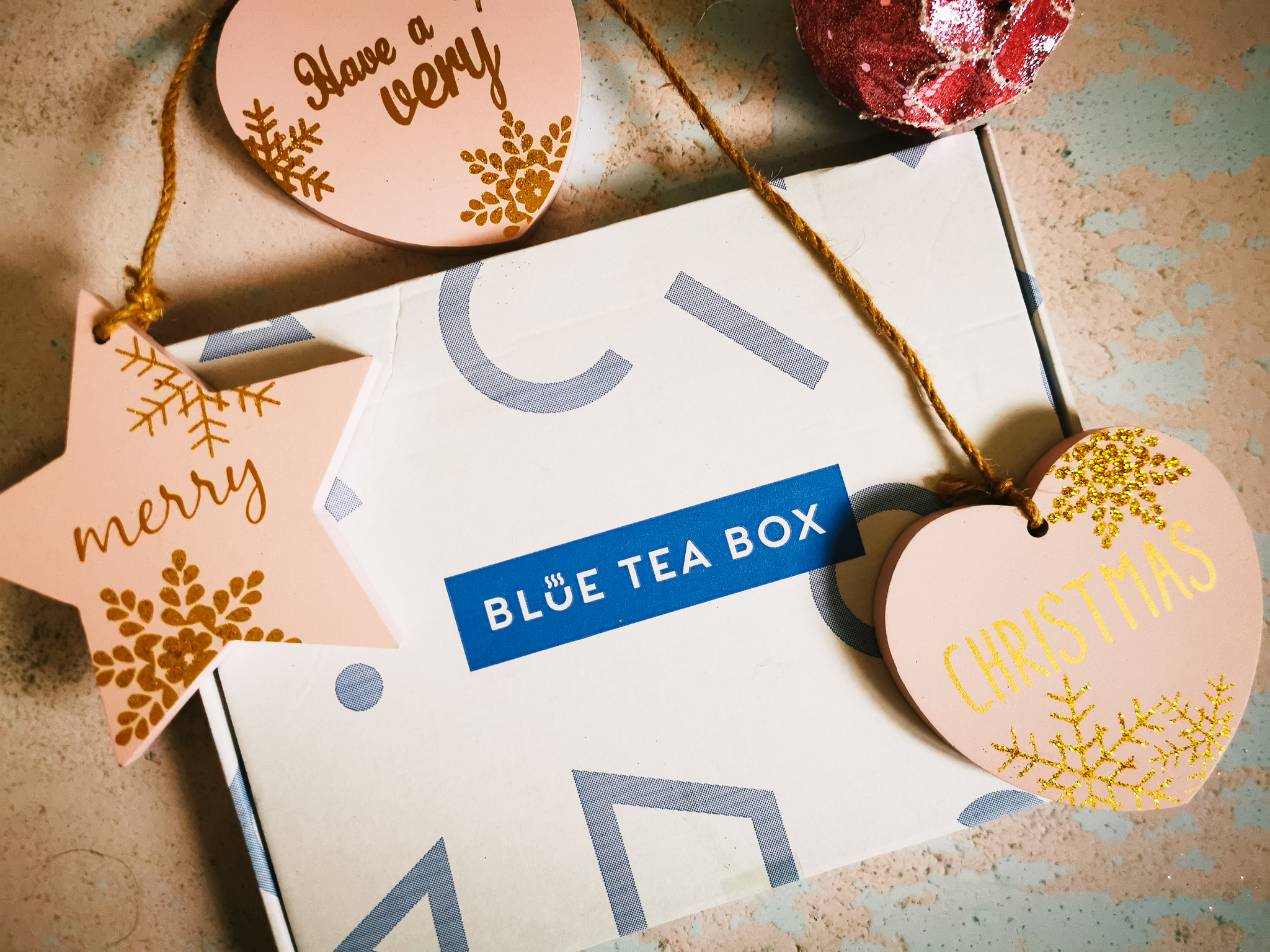 blue tea box in a christmas flatlay