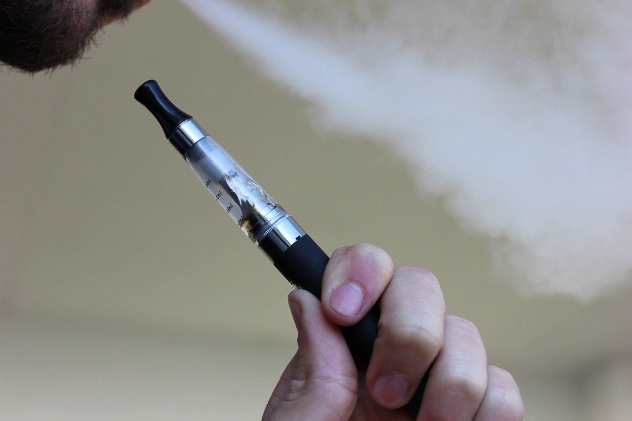 vape stick close to a persons mouth