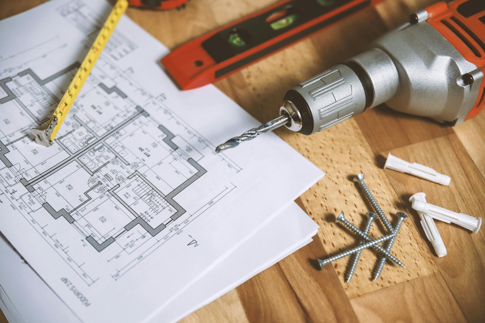 diy plans wih a tape meaure, drill, spirit level, nails and white rawl plugs