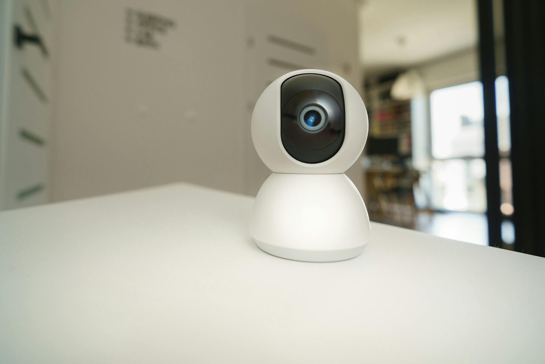 Modern home security surveillance camera mounted on exterior wall